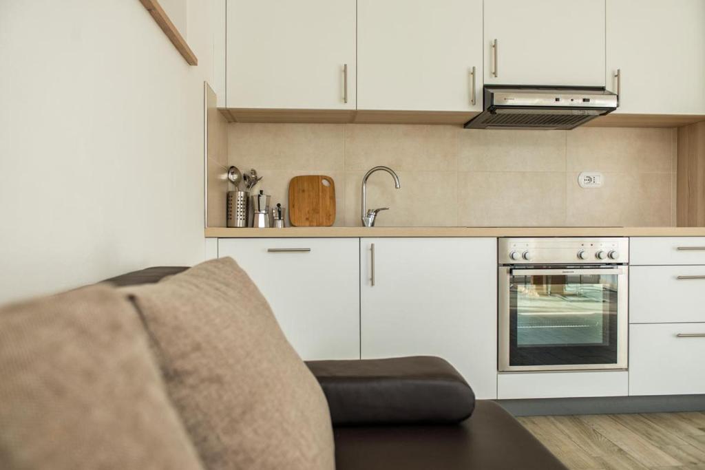 Kuchyň nebo kuchyňský kout v ubytování Apartment Residence Veronika