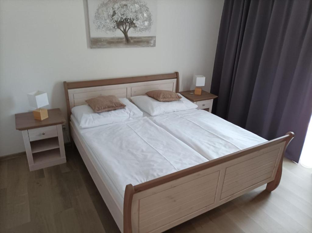 Postel nebo postele na pokoji v ubytování Wellness penzion Marta