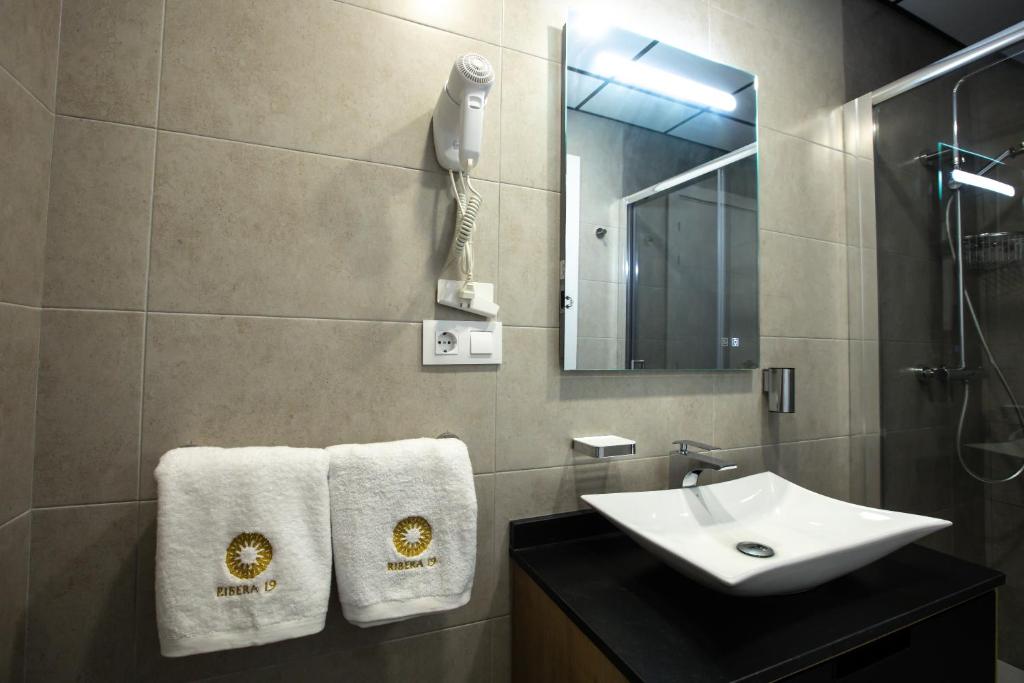 Kúpeľňa v ubytovaní Apartamentos Ribera 19