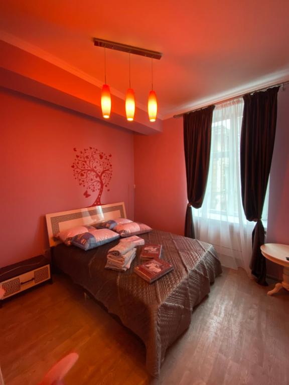 Кровать или кровати в номере Квартира подобово в центрі на вулиці Краківській 34а Площа Ринок сам центер міста Львова