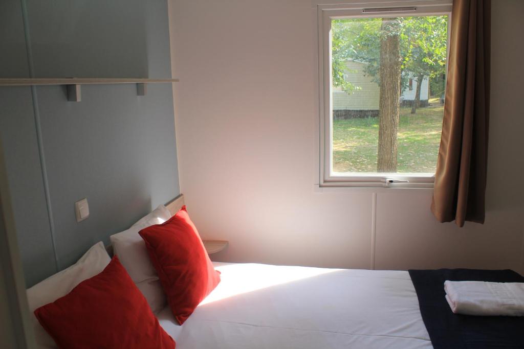 Postel nebo postele na pokoji v ubytování Camping La Fundicion