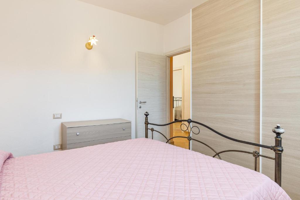 Postel nebo postele na pokoji v ubytování Villa Tomaso