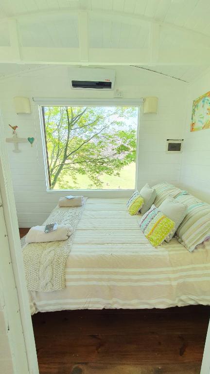 Cama o camas de una habitación en El Vagón B&B