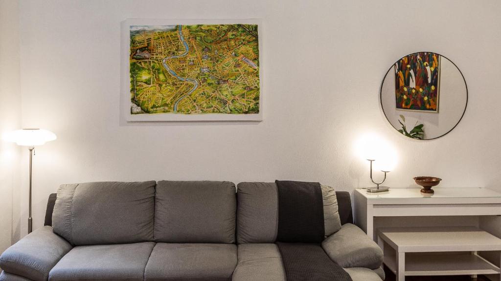 A seating area at Cartari Rental in Rome Apartment