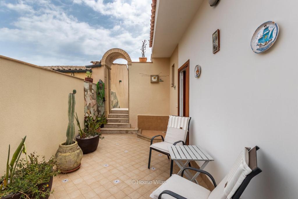 A balcony or terrace at House&Villas - La casa delle Stelle