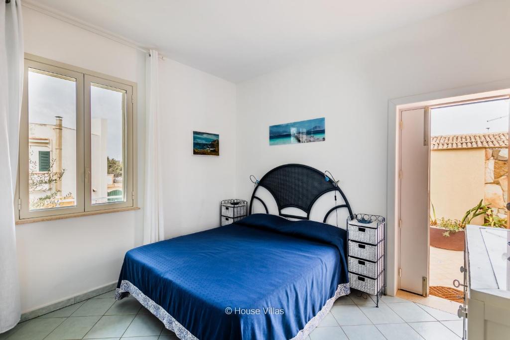 A bed or beds in a room at House&Villas - La casa delle Stelle