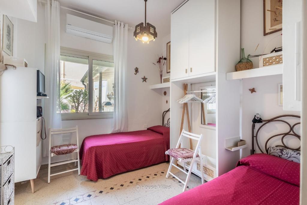 A bed or beds in a room at House&Villas - La casa delle Stelle