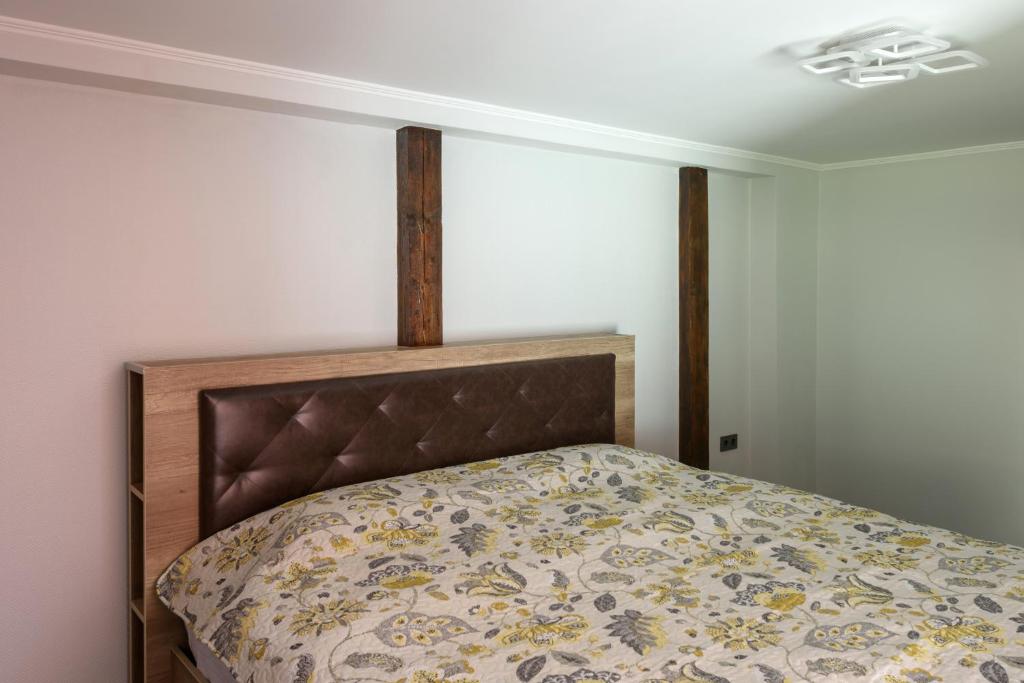 Postel nebo postele na pokoji v ubytování Apart Hotel Fusion