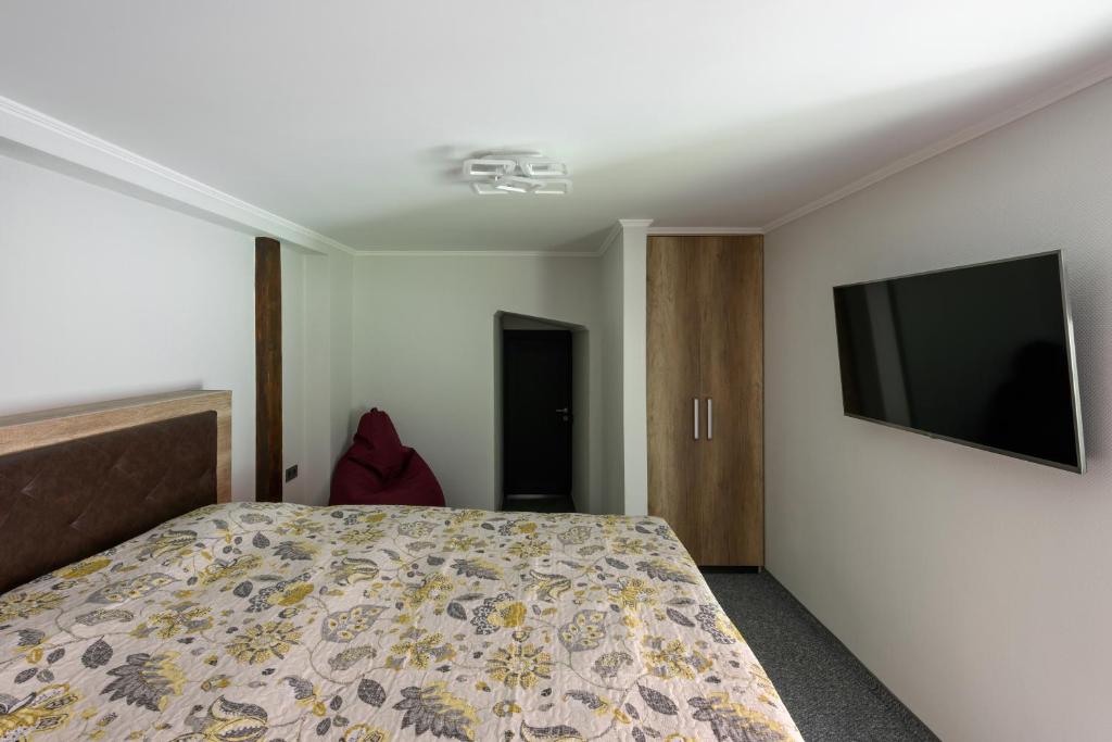 TV a/nebo společenská místnost v ubytování Apart Hotel Fusion