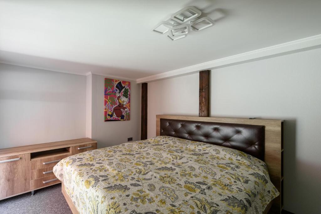Postel nebo postele na pokoji v ubytování Apart Hotel Fusion