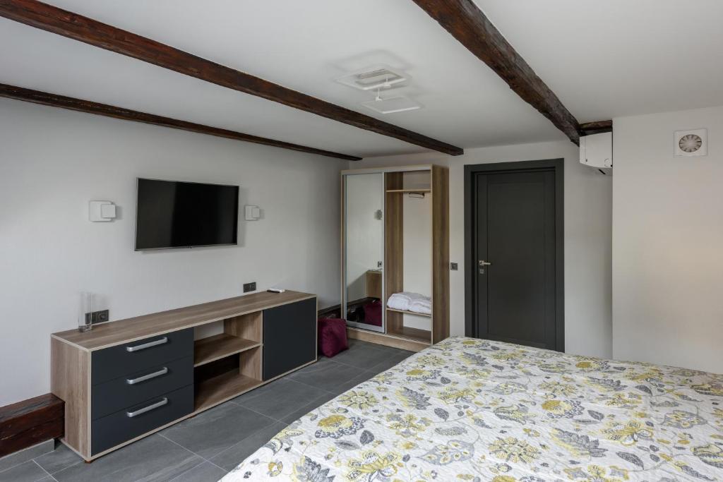 TV a/nebo společenská místnost v ubytování Apart Hotel Fusion