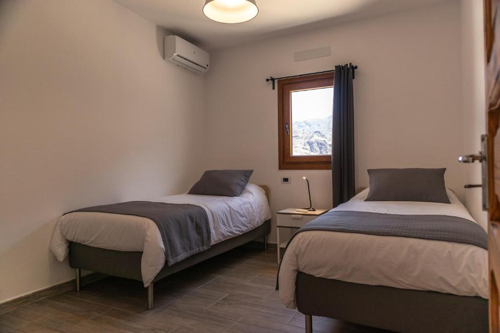 A bed or beds in a room at El blanquizal A
