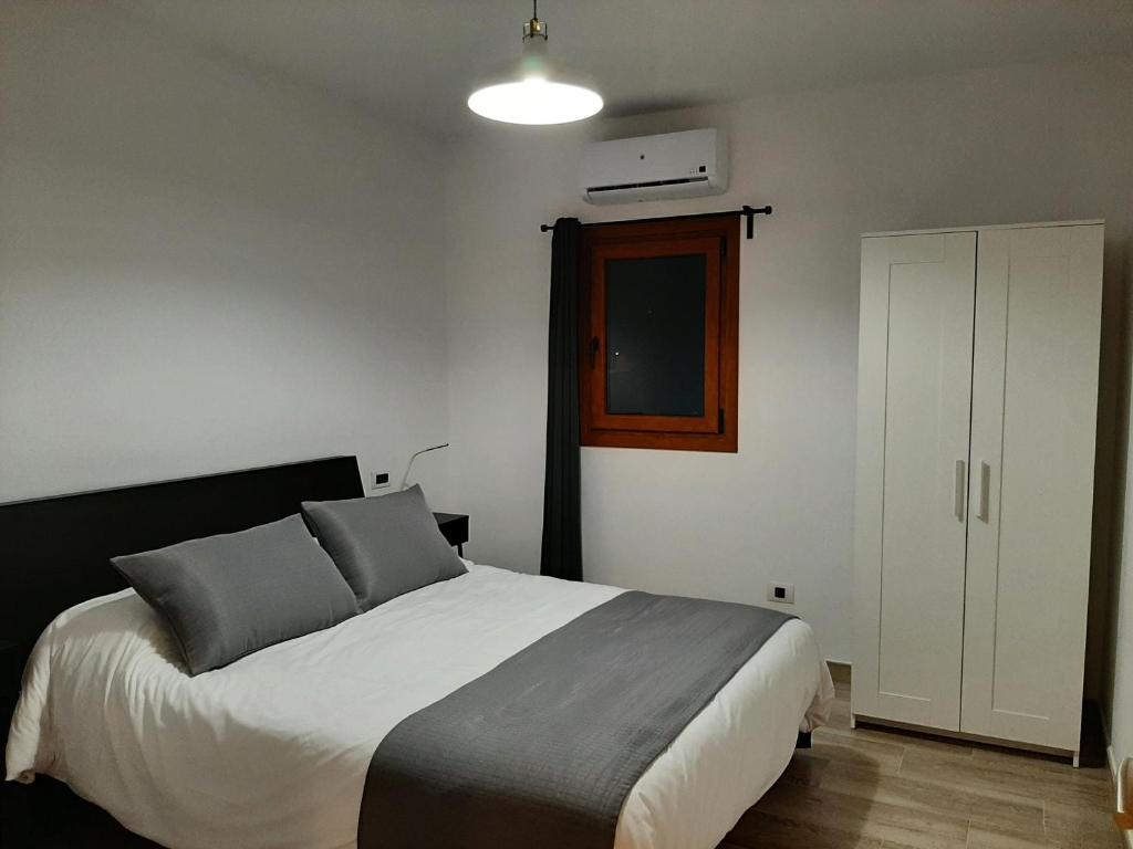 A bed or beds in a room at El blanquizal A