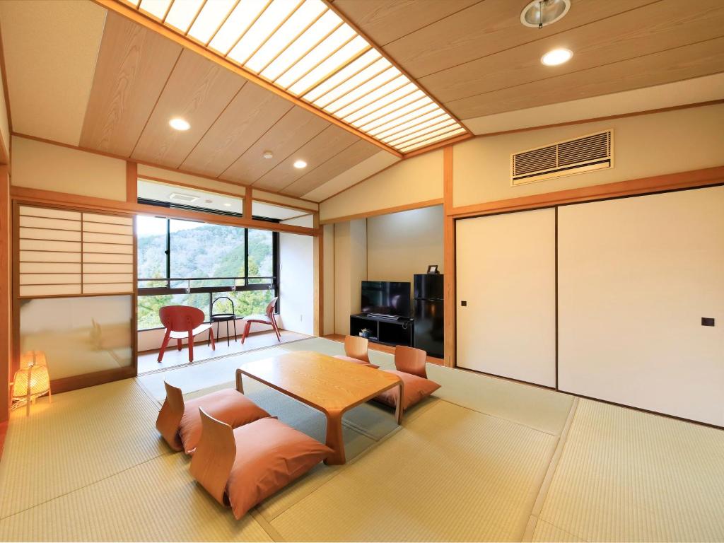 TV a/nebo společenská místnost v ubytování Hot Spring Inn Hakone Suisen