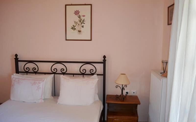 Postel nebo postele na pokoji v ubytování Alexandraki Rooms