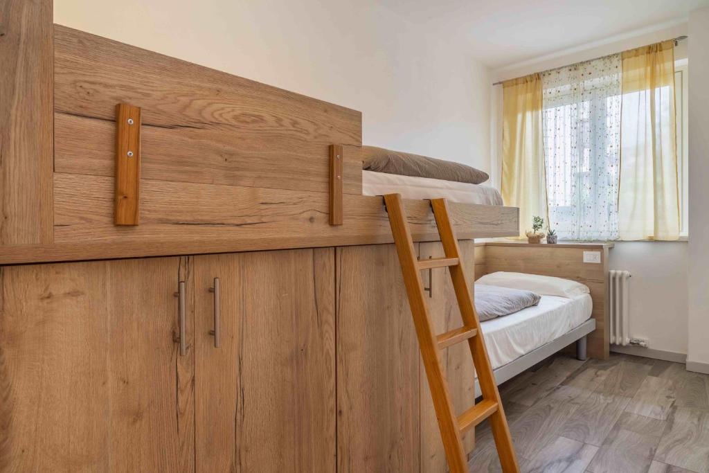 Postel nebo postele na pokoji v ubytování Appartamenti Decarli