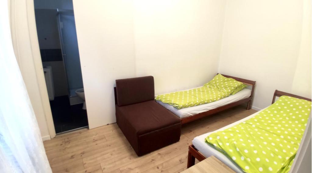 Posteľ alebo postele v izbe v ubytovaní Mátrai Vándor Apartmanok