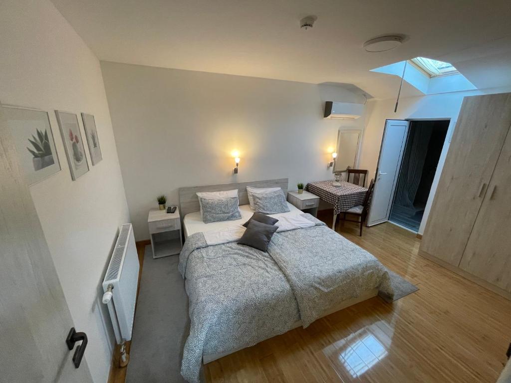 Letto o letti in una camera di TEPIĆ Garni Hotel