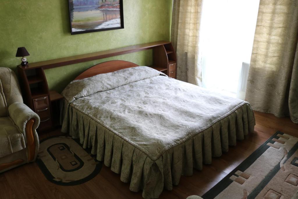 Postel nebo postele na pokoji v ubytování Готель ***ФЕЄРІЯ