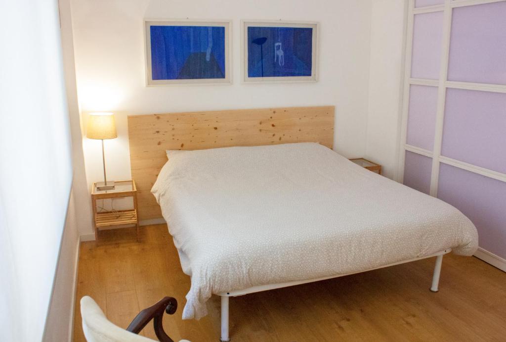 Кровать или кровати в номере Putignani 178