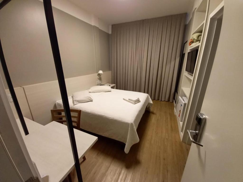 Postel nebo postele na pokoji v ubytování Hotel Emacite Flex