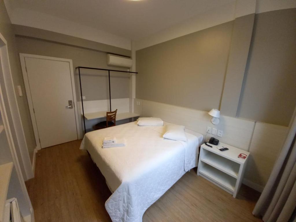 Postel nebo postele na pokoji v ubytování Hotel Emacite Flex
