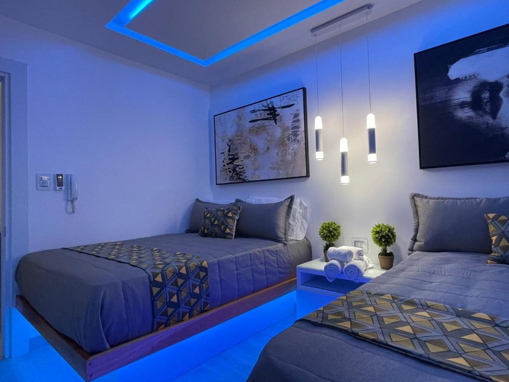 Postel nebo postele na pokoji v ubytování Alegria Hostal
