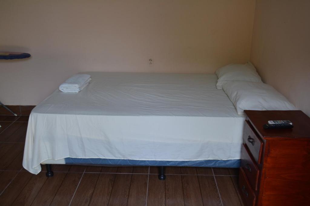 Posteľ alebo postele v izbe v ubytovaní Apartamentos y Hostal RUDON #1