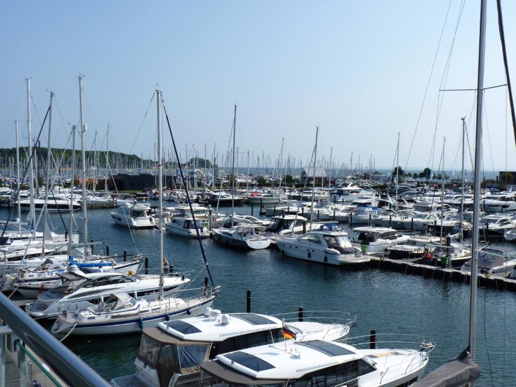 a bunch of boats docked in a harbor at ancora Marina Haus 1 Nr 08, Typ 2 in Neustadt in Holstein
