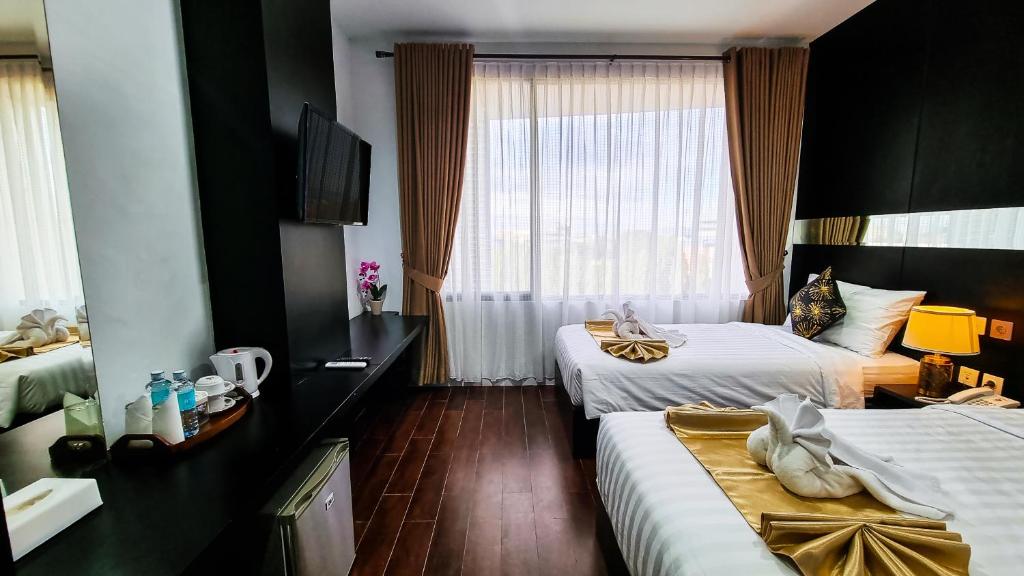 Hotel Rasamala - Salle Double Ou Jumelle