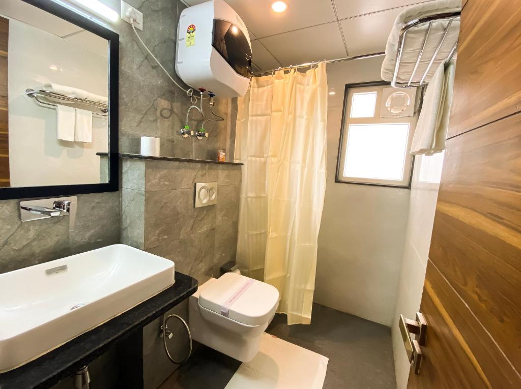 Koupelna v ubytování Sky Suites