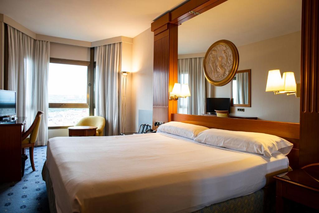 Postel nebo postele na pokoji v ubytování Hotel los Bracos