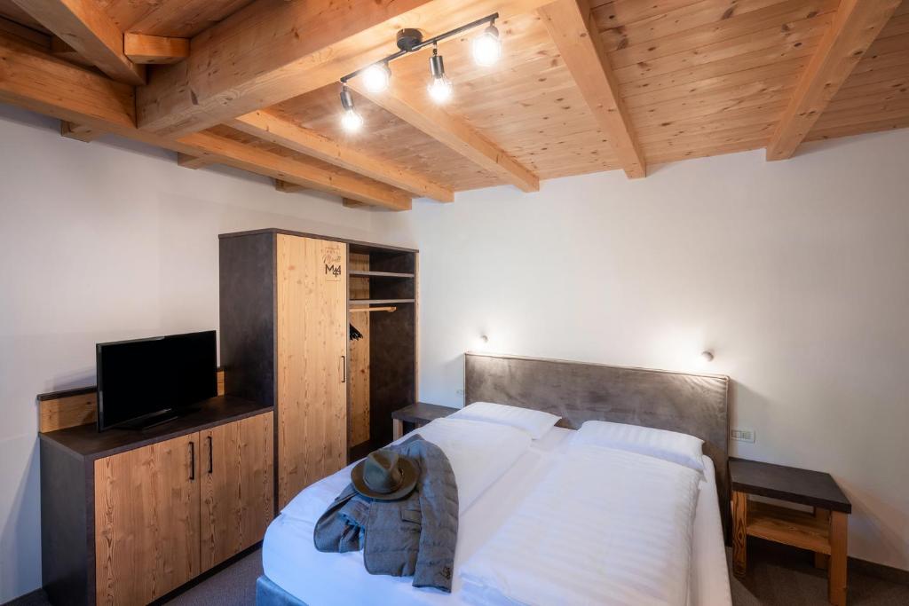 Postel nebo postele na pokoji v ubytování Hotel Monte44