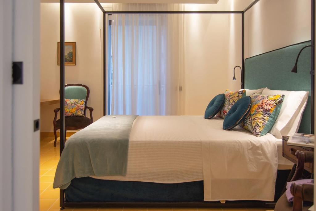 Postel nebo postele na pokoji v ubytování B&B Nicotera29