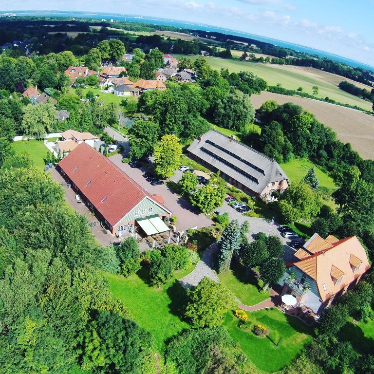 an overhead view of a house with a building at Landhaus Töpferhof bei Travemünde in Travemünde