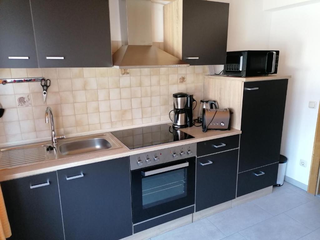Kuchyň nebo kuchyňský kout v ubytování Ferienwohnung Vogl