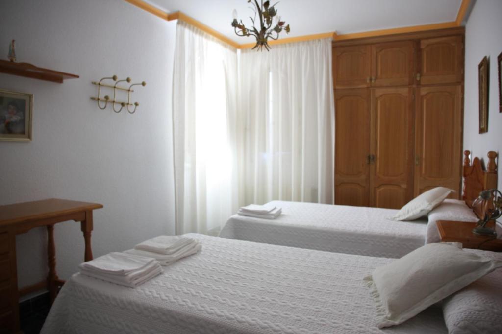 Postel nebo postele na pokoji v ubytování Villa Rural Paquete