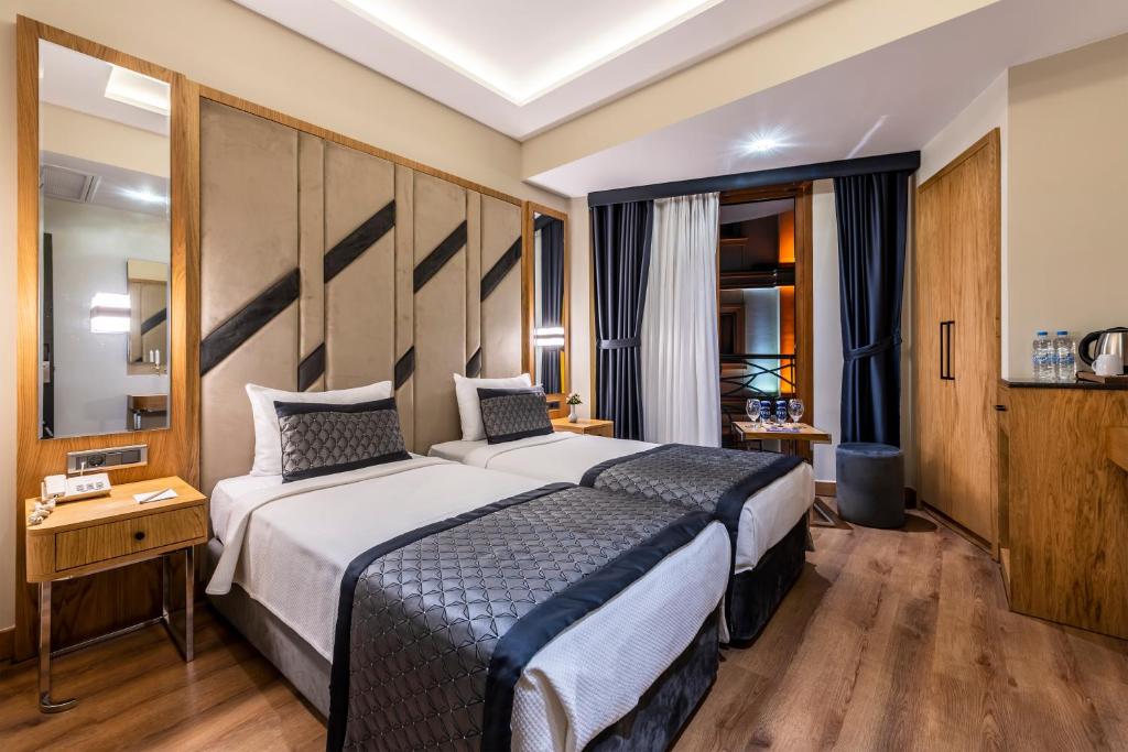 a bedroom with a large bed in a room at Endican Sultanahmet Hotel in Istanbul