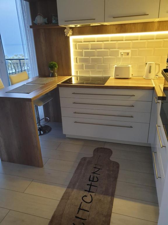 Kuchnia lub aneks kuchenny w obiekcie Best Panoráma Apartman