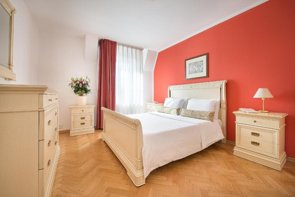 Ένα ή περισσότερα κρεβάτια σε δωμάτιο στο Hotel Suite Home Prague