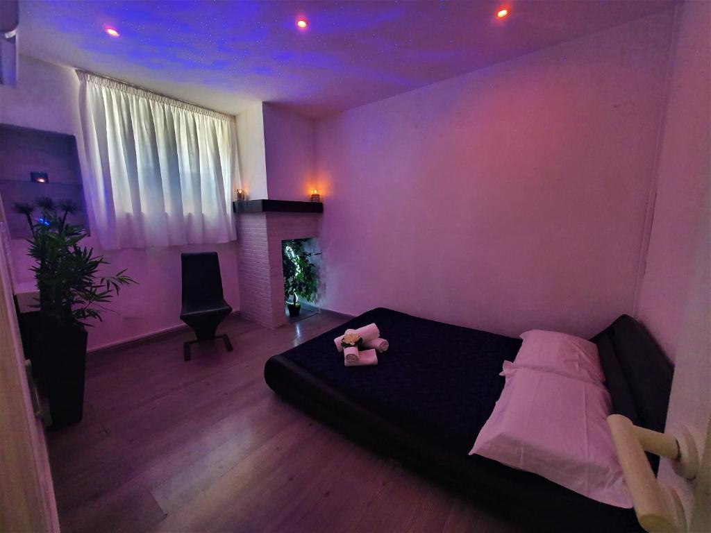 Postel nebo postele na pokoji v ubytování Alchimia Luxury Suites