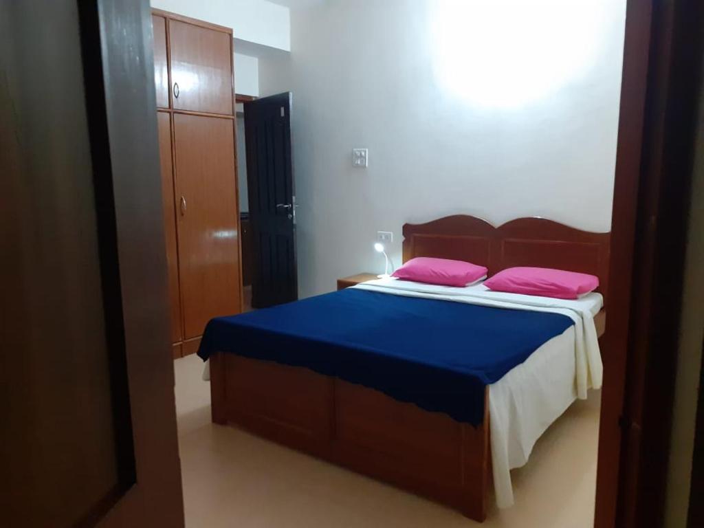 Postel nebo postele na pokoji v ubytování Antonio's Residency Goa