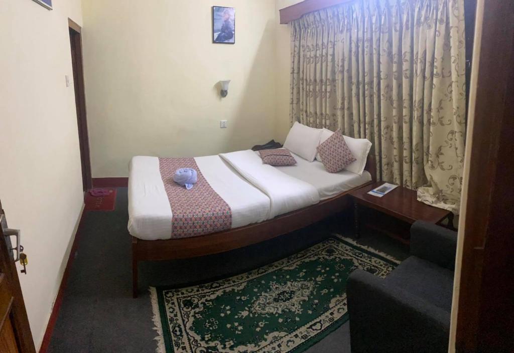 Postel nebo postele na pokoji v ubytování Hotel Blue Magnet