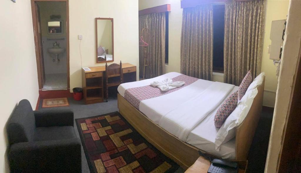 Postel nebo postele na pokoji v ubytování Hotel Blue Magnet