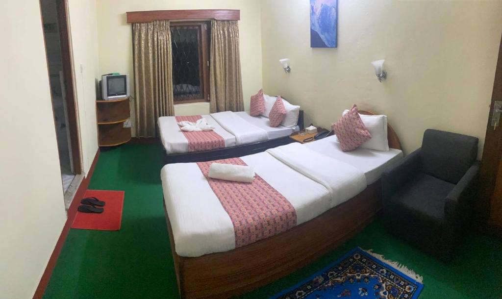 Postel nebo postele na pokoji v ubytování Hotel Blue Magnet