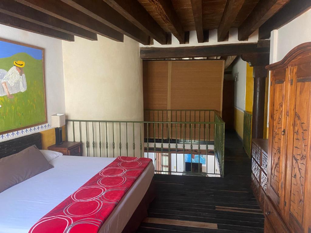 Postel nebo postele na pokoji v ubytování Villa Serena Centro Historico