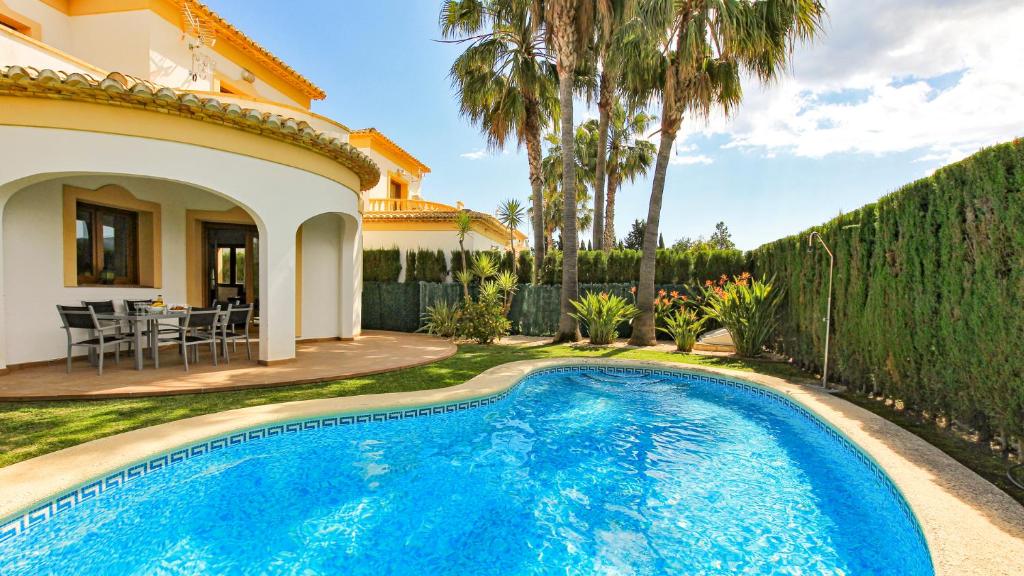 Bazén v ubytování Villa El Palmar nebo v jeho okolí