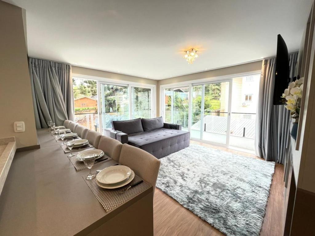 Khu vực ghế ngồi tại Apartamento Luz da Aurora - Próximo a Rua Coberta