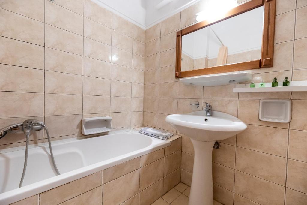 Kúpeľňa v ubytovaní Famissi Eden Hotel