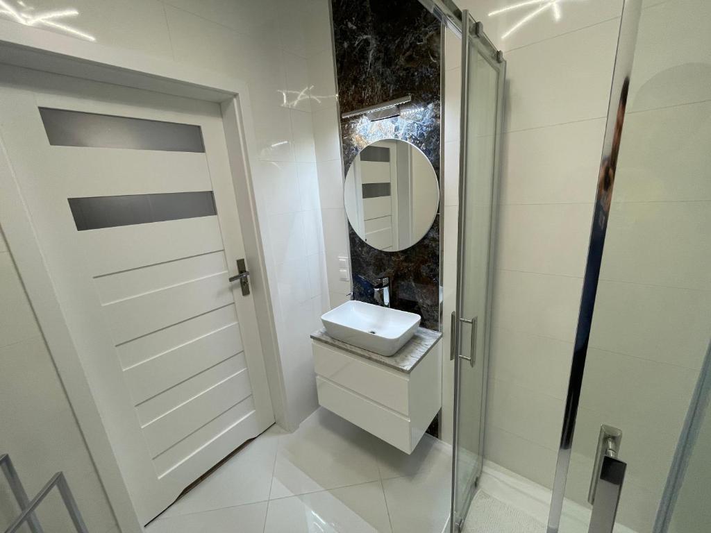 Kúpeľňa v ubytovaní Apartament Biała Róża